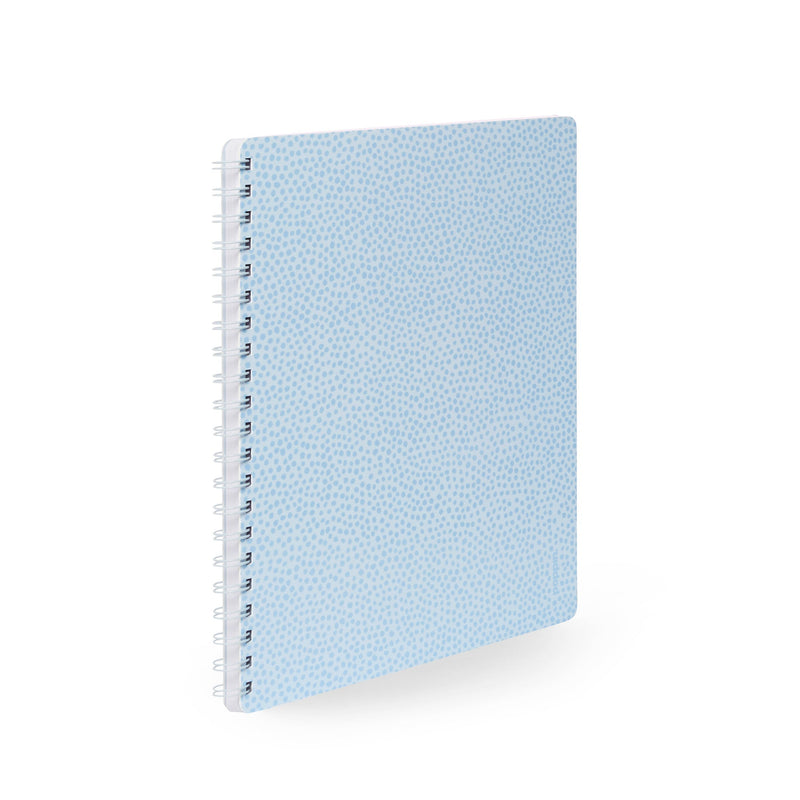 Blue spiral notebook with dotted cover design on white background. (Sky)